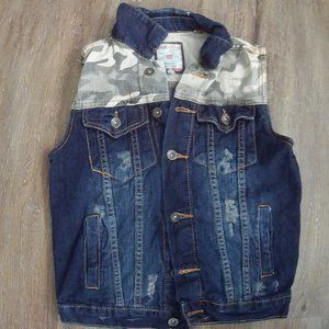 girls medium evolution jean vest with a camoflauge accent